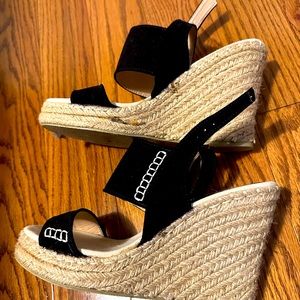 Size 6.5 wedge heel shoes.